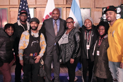 Senator Sims and Sheila Brown (center) onstage with the cohort from the Mirkopoulos Internship Program