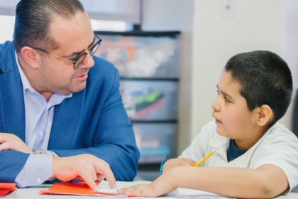 Alex Pissios mentors a student in Chicago