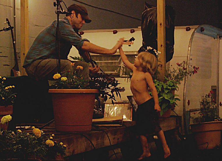 Konrad Wert on the road with his son