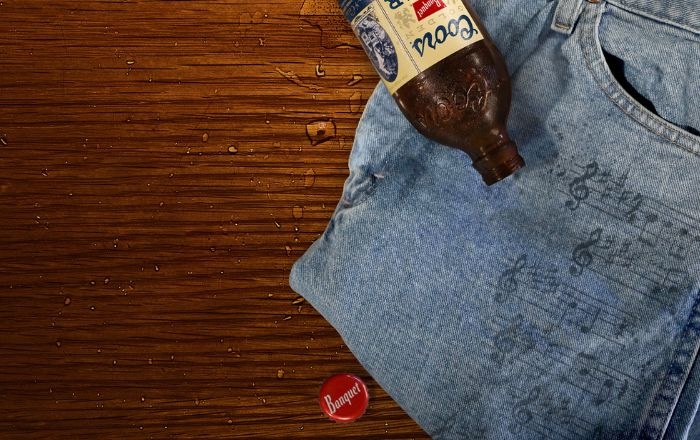 Coors Banquet x Wrangler use beer-ink to print song chords on jeans